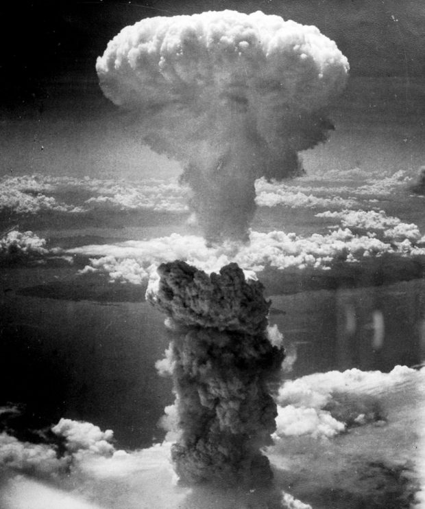 Atomic Cloud Rises Over Nagasaki, Japan. Photo by Lieutenant Charles Levy, 1945, via Wikimedia Commons.